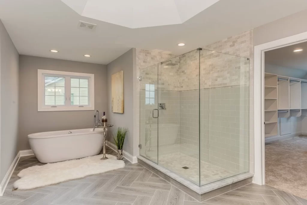 glass shower enclosure, frameless glass shower, modern bathroom with glass shower, custom glass shower doors, bathroom renovation with glass enclosure, walk-in glass shower design, glass shower enclosure Brampton, glass shower Mississauga, GTA glass shower installation, sleek bathroom glass shower